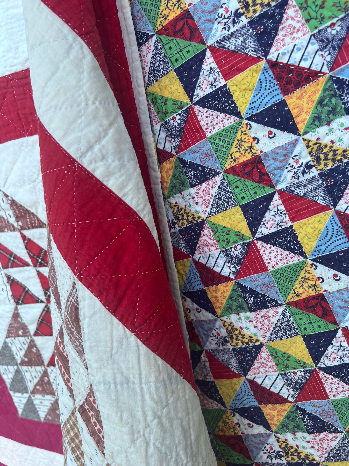 Complex variation of the Feathered Star quilt with a bold red and the tiniest hand quilting stitches Antique quilt