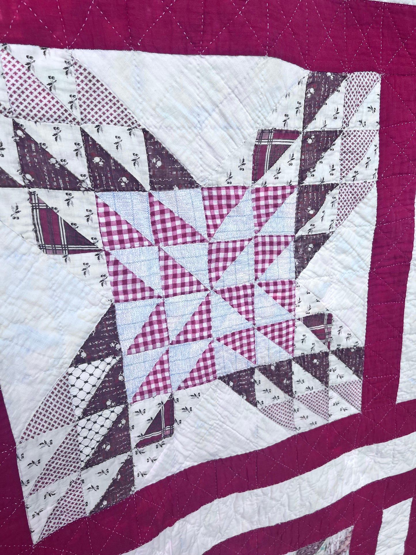 Complex  variation of the Feathered Star quilt with a bold red and the tiniest hand quilting stitches Antique quilt