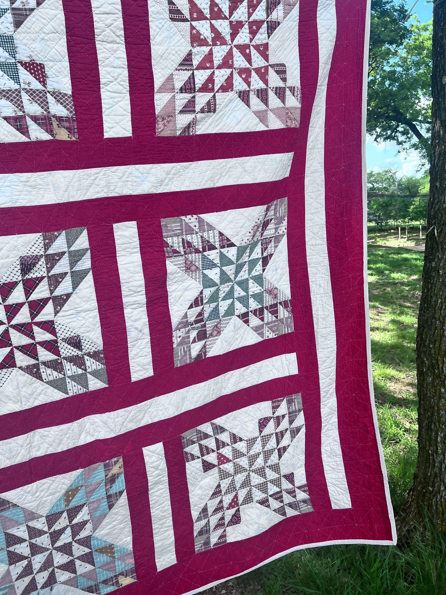 Complex  variation of the Feathered Star quilt with a bold red and the tiniest hand quilting stitches Antique quilt