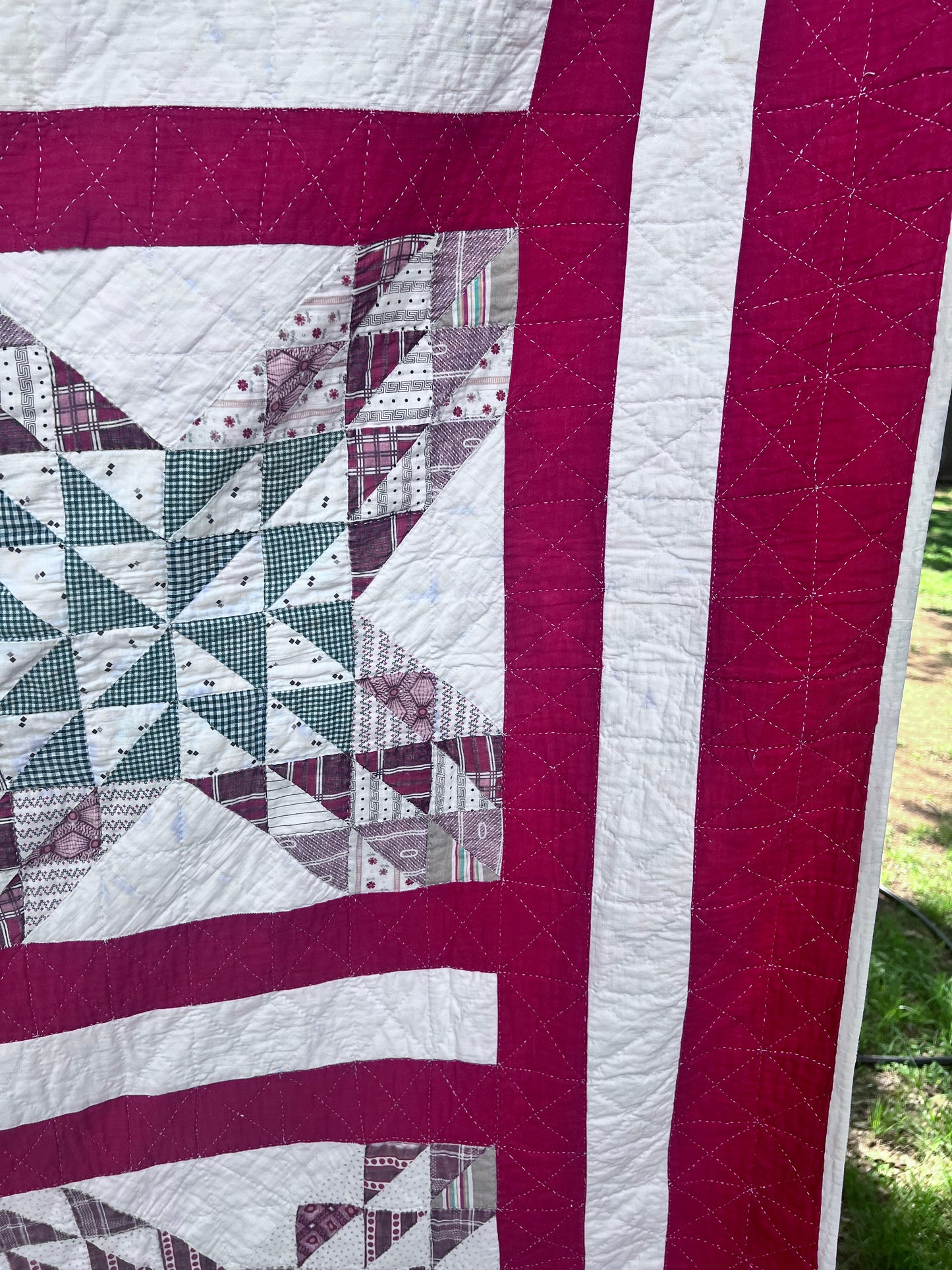 Complex  variation of the Feathered Star quilt with a bold red and the tiniest hand quilting stitches Antique quilt