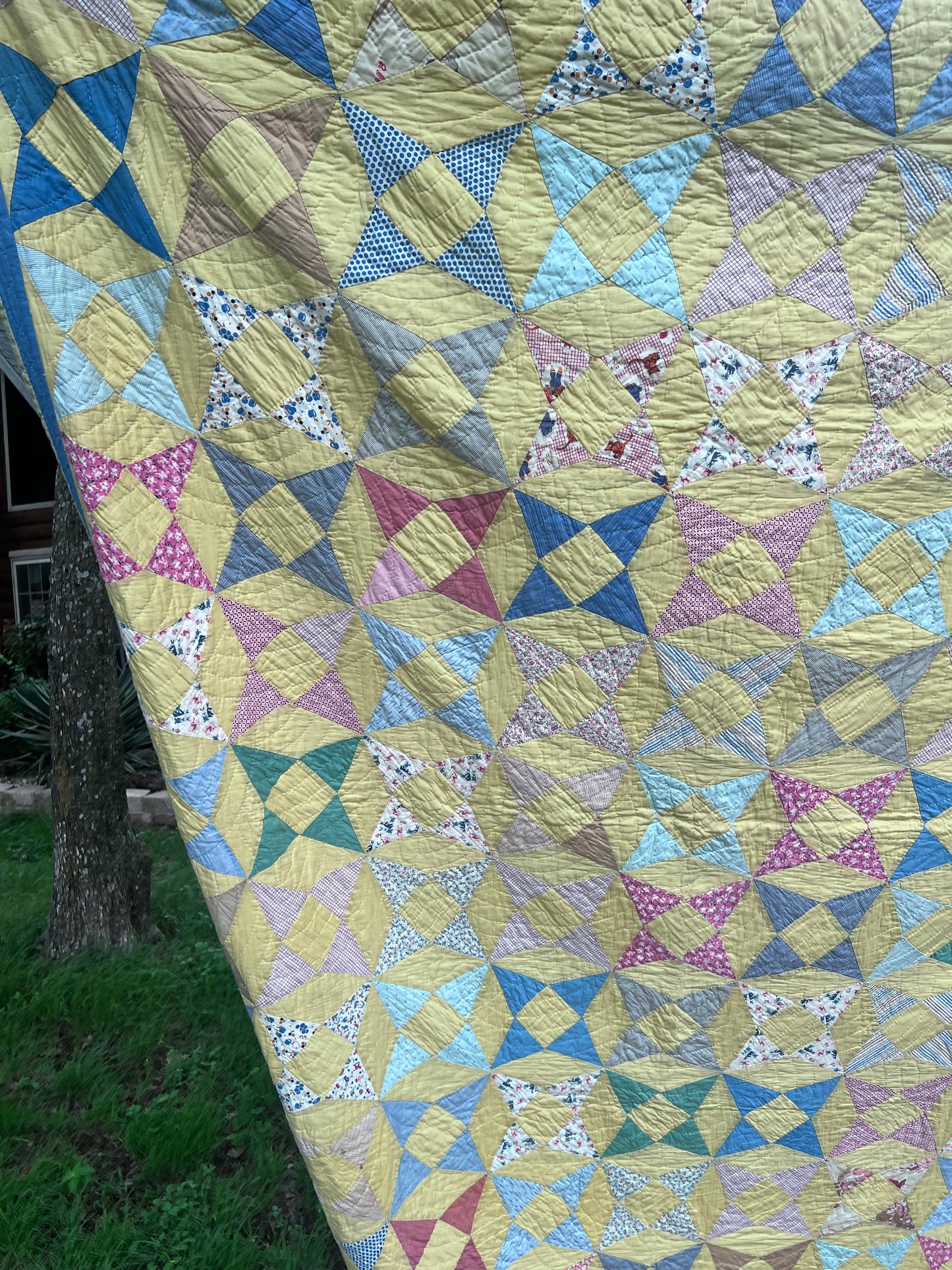 A variation of a Kaleidoscope or Star Puzzle Antique quilt in the most glorious pastels.