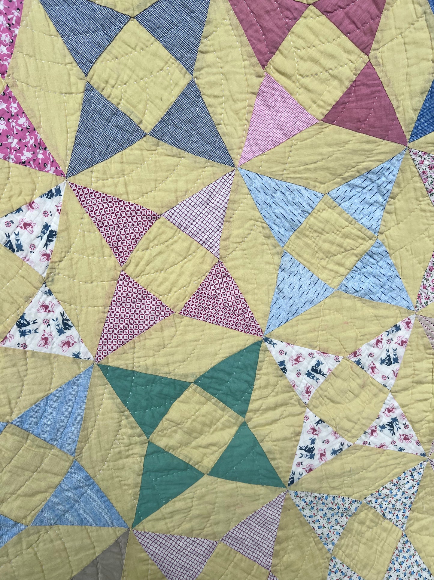 A variation of a Kaleidoscope or Star Puzzle Antique quilt in the most glorious pastels.