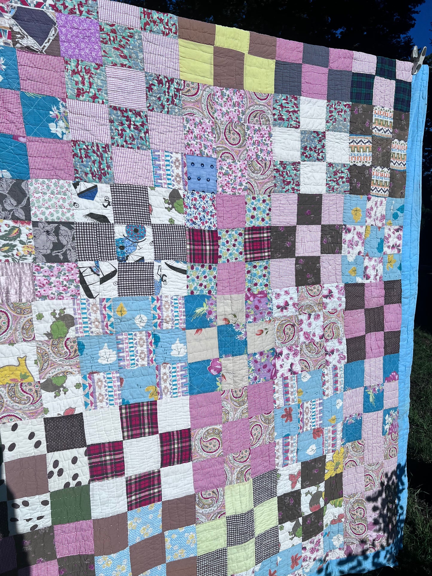 A classic Nine-Patch quilt, which is one of the most fundamental and versatile patterns as a cutter/crafter
