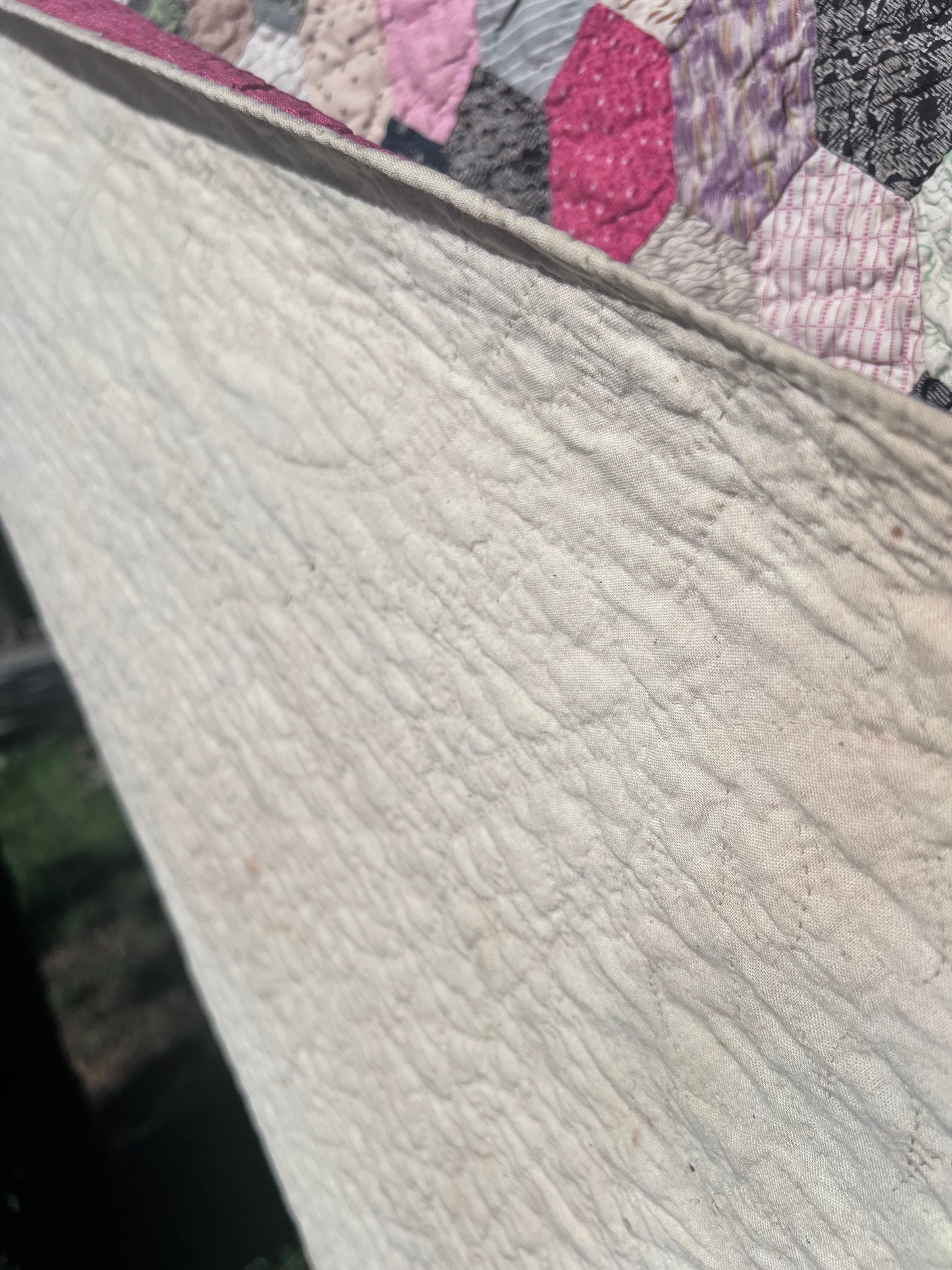 Hexagon pattern, often referred to in quilting as Grandmother’s Flower Garden when arranged in floral clusters, or simply a Hexie quilt.