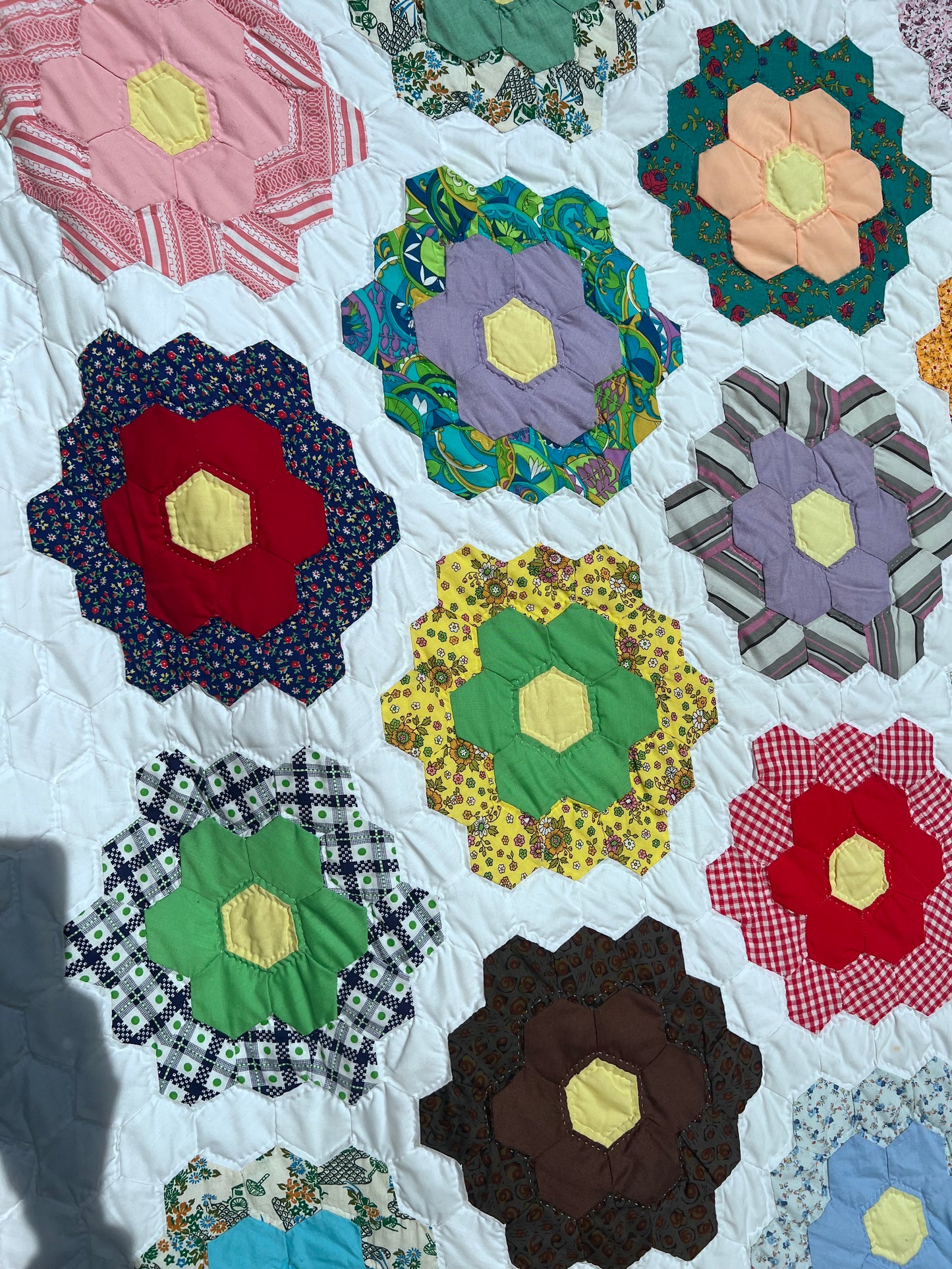 Exceptional Grandmother's Flower Garden quilt, one of the most beloved traditional American quilt patterns