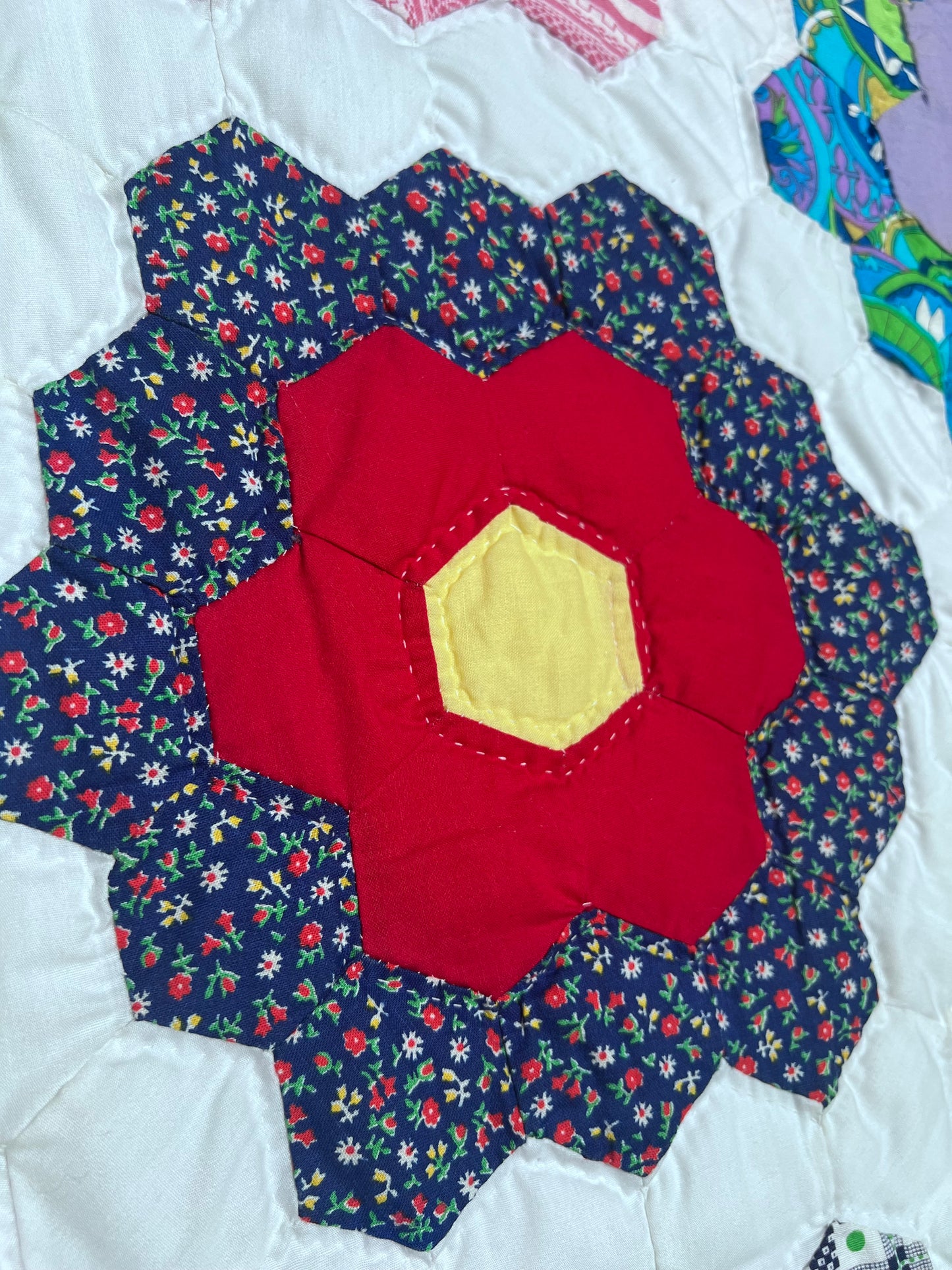 Exceptional Grandmother's Flower Garden quilt, one of the most beloved traditional American quilt patterns