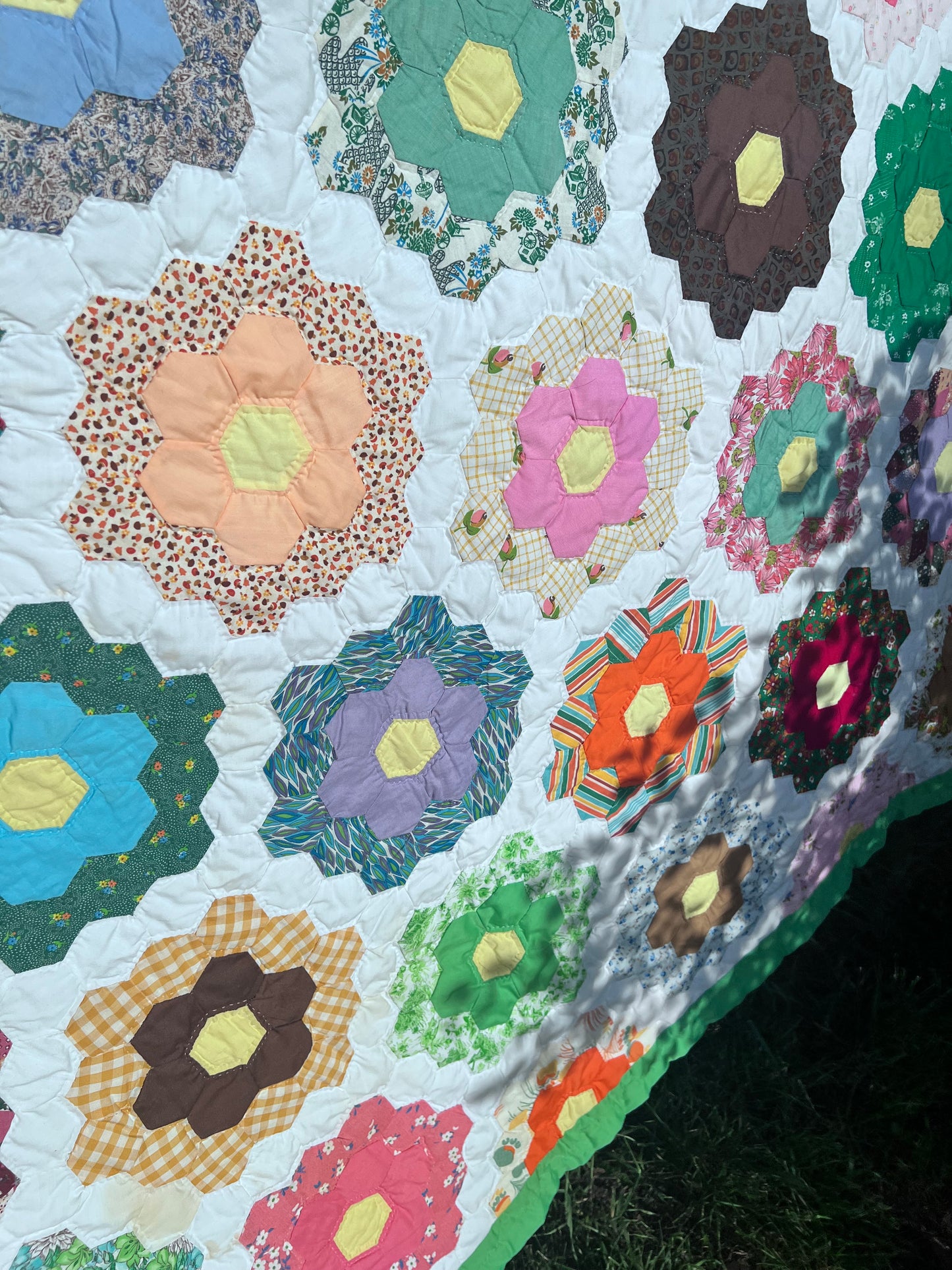 Exceptional Grandmother's Flower Garden quilt, one of the most beloved traditional American quilt patterns