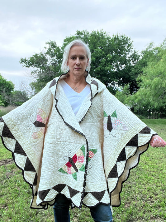 Glorious butterfly quilt made into a beautiful wrap/poncho look. One size fits all.