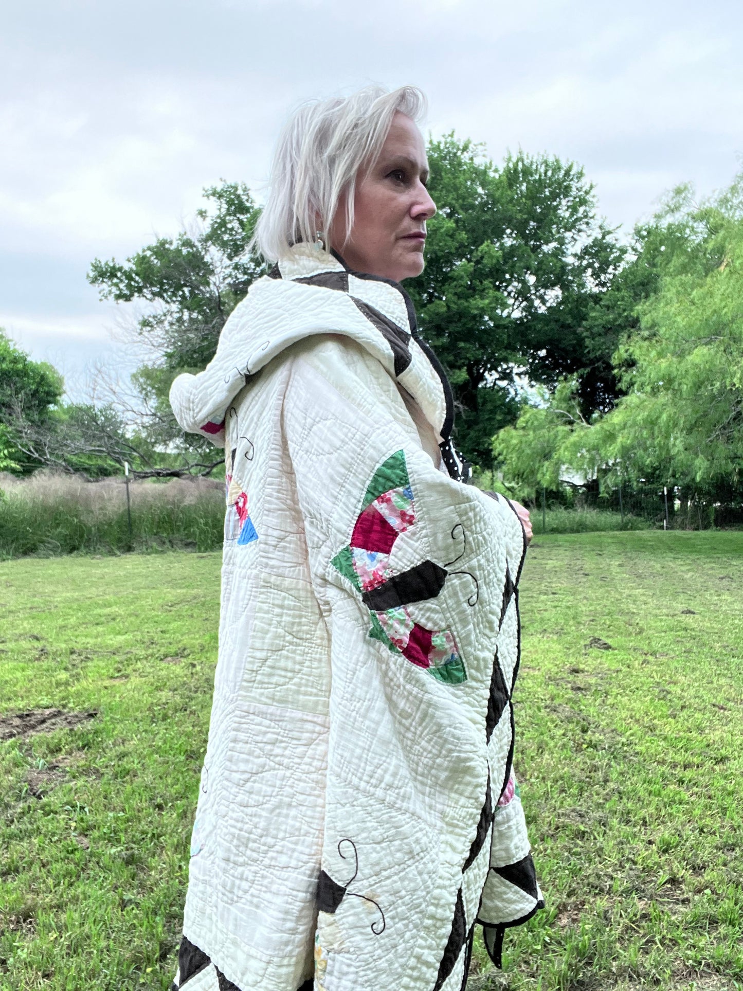 Glorious butterfly quilt made into a beautiful wrap/poncho look. One size fits all.