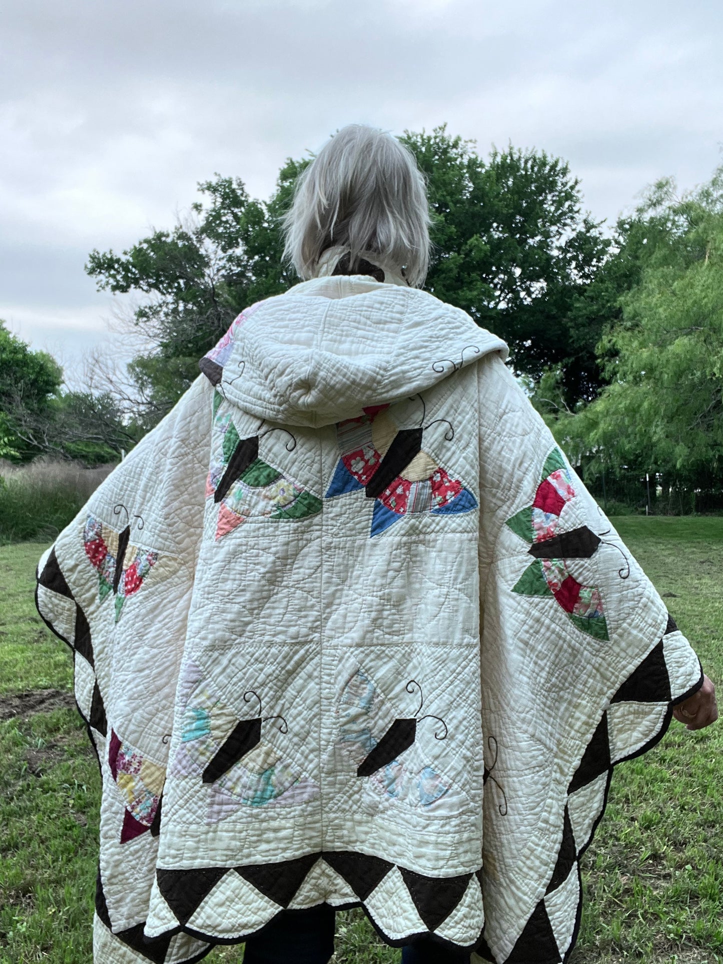 Glorious butterfly quilt made into a beautiful wrap/poncho look. One size fits all.