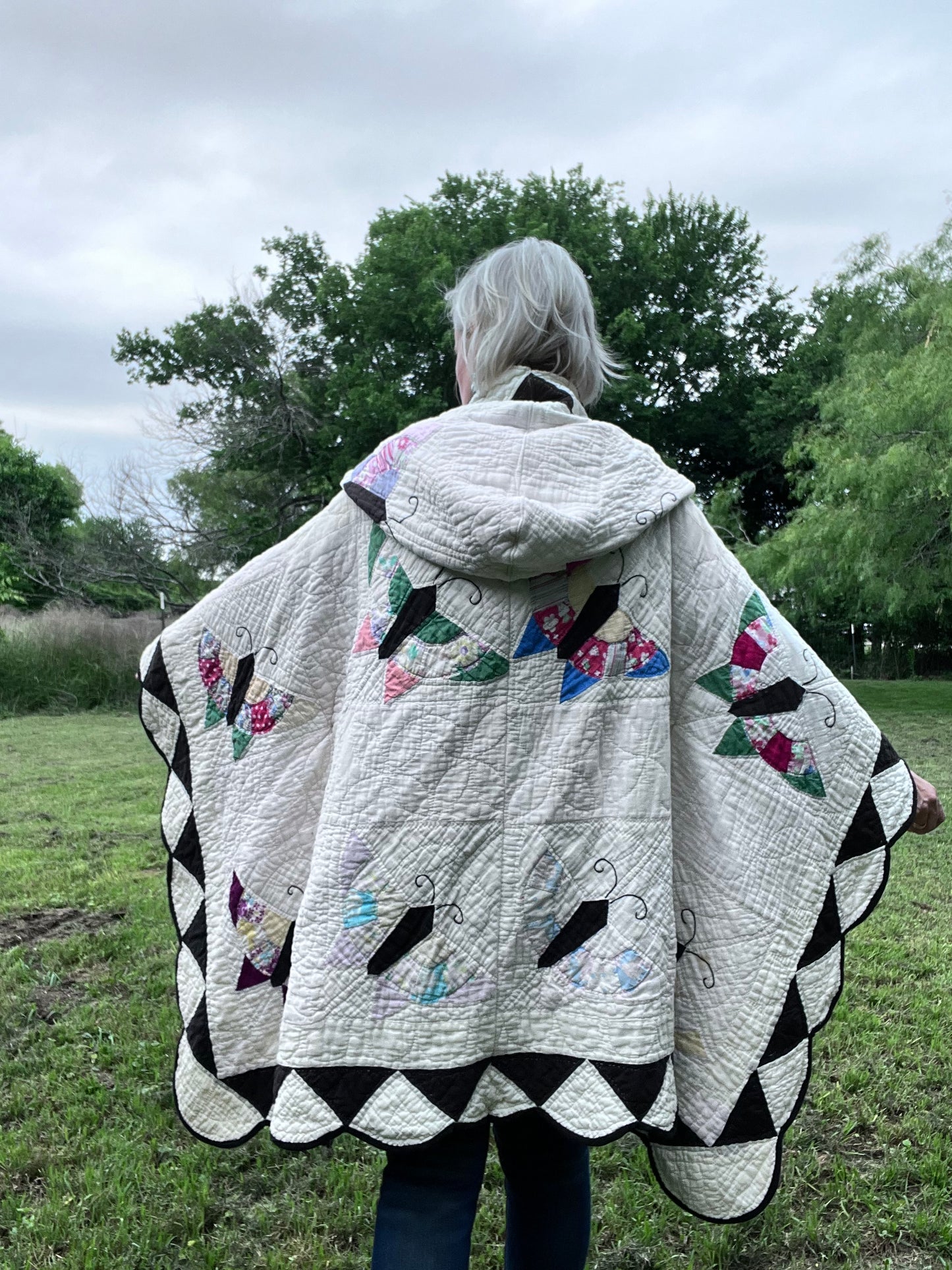 Glorious butterfly quilt made into a beautiful wrap/poncho look. One size fits all.
