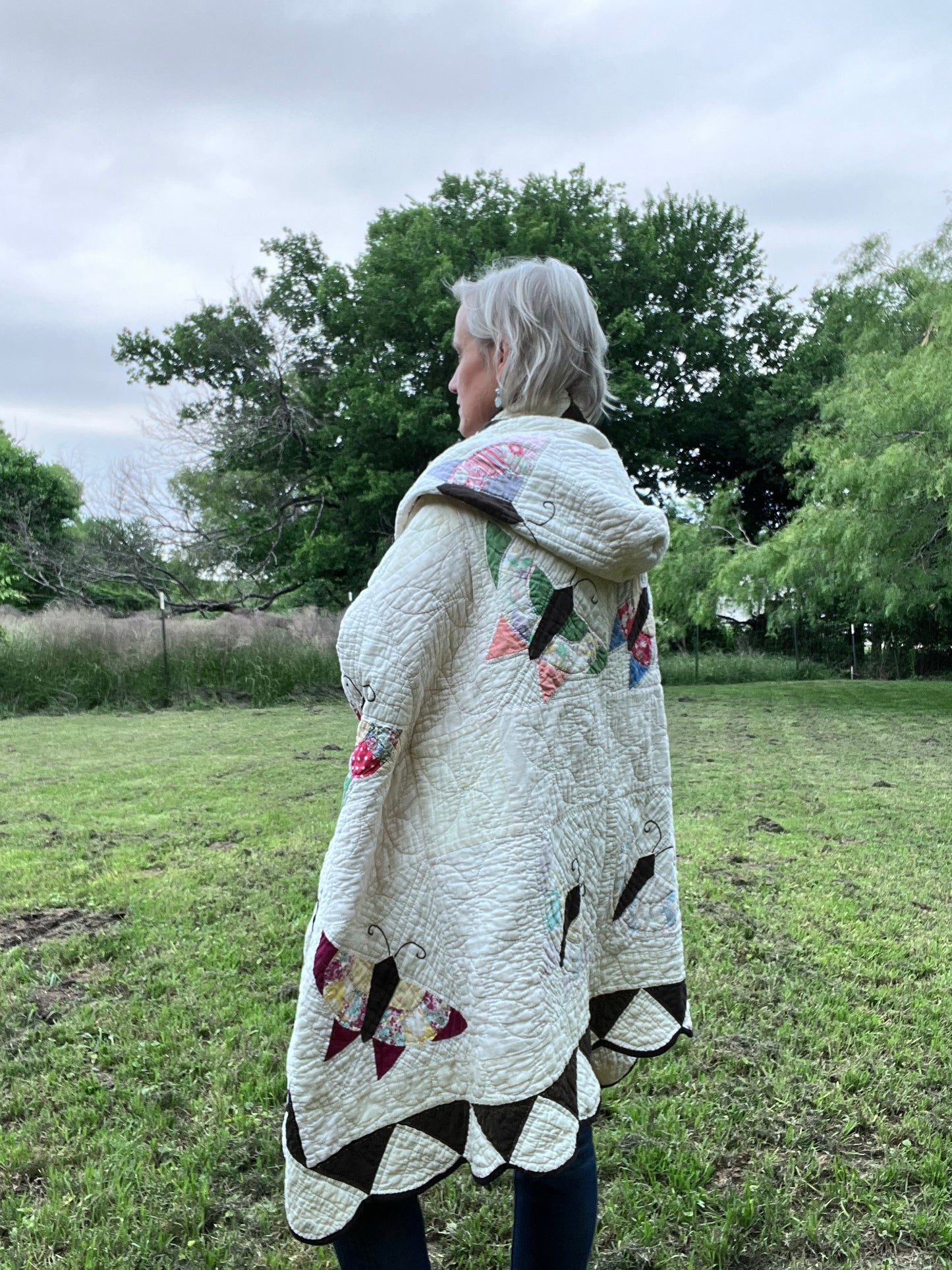 Glorious butterfly quilt made into a beautiful wrap/poncho look. One size fits all.