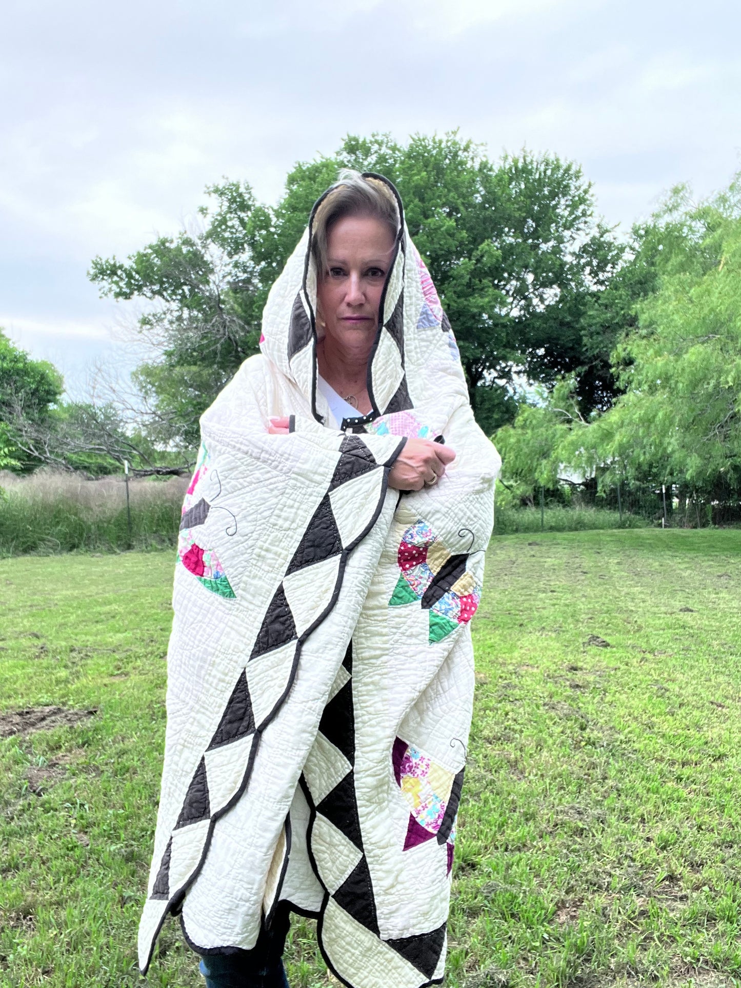 Glorious butterfly quilt made into a beautiful wrap/poncho look. One size fits all.