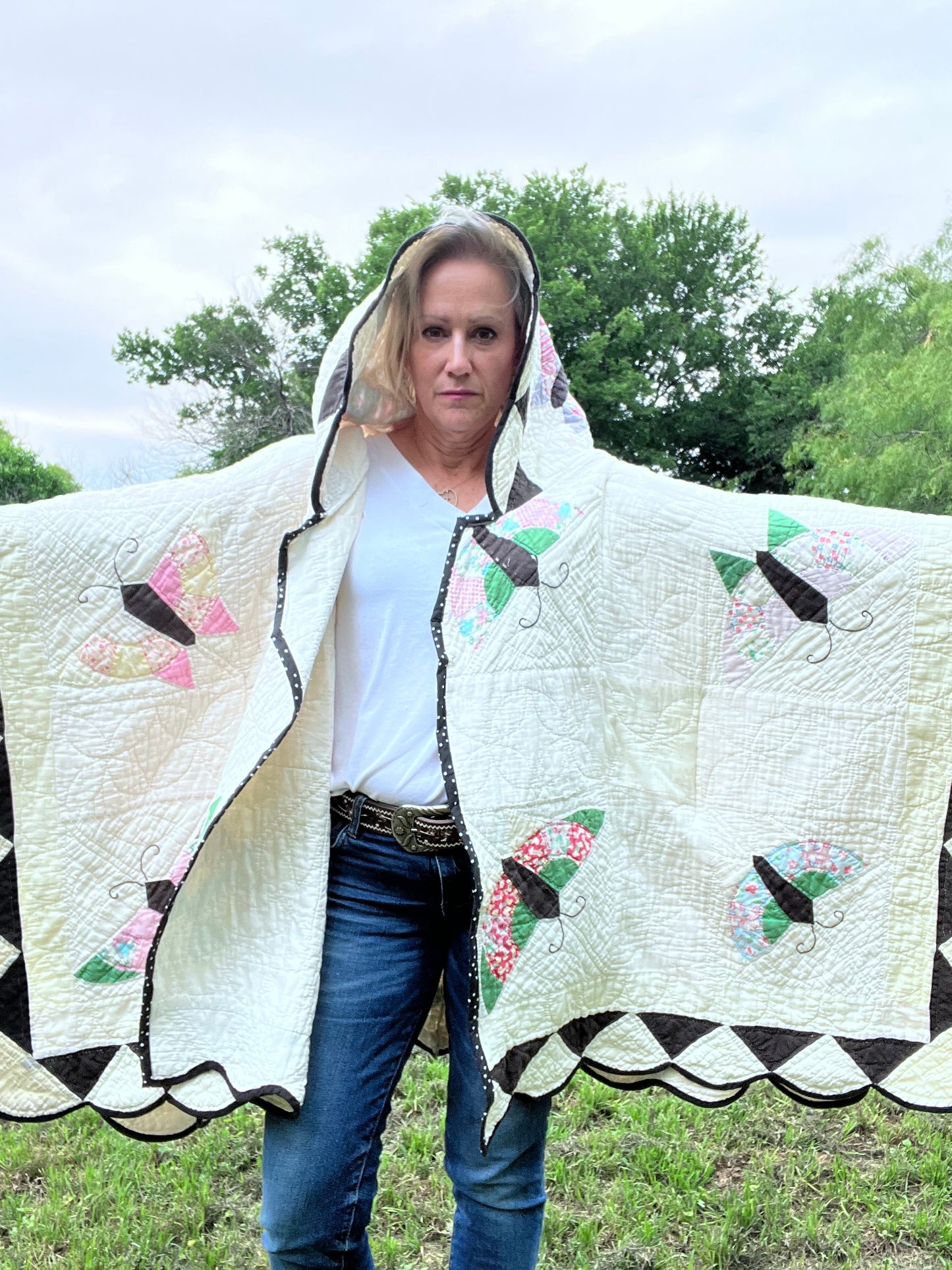 Glorious butterfly quilt made into a beautiful wrap/poncho look. One size fits all.