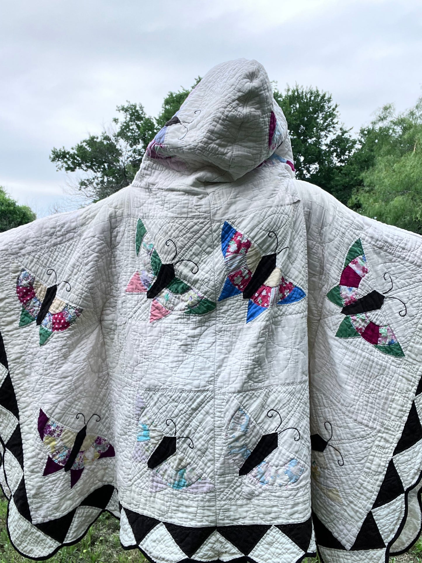 Glorious butterfly quilt made into a beautiful wrap/poncho look. One size fits all.