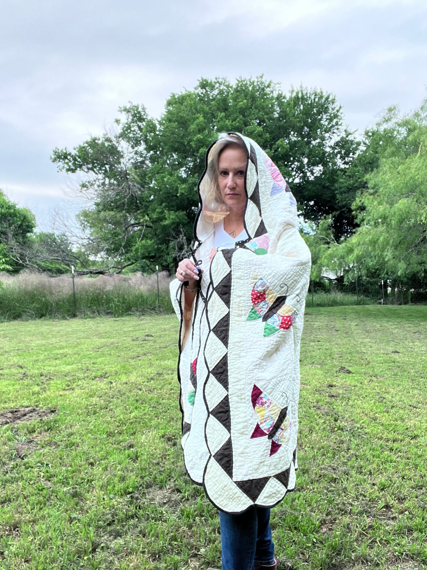 Glorious butterfly quilt made into a beautiful wrap/poncho look. One size fits all.