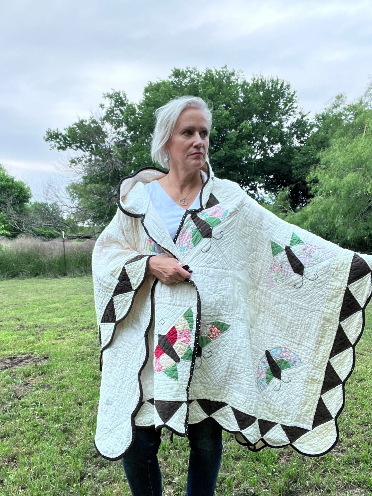 Glorious butterfly quilt made into a beautiful wrap/poncho look. One size fits all.