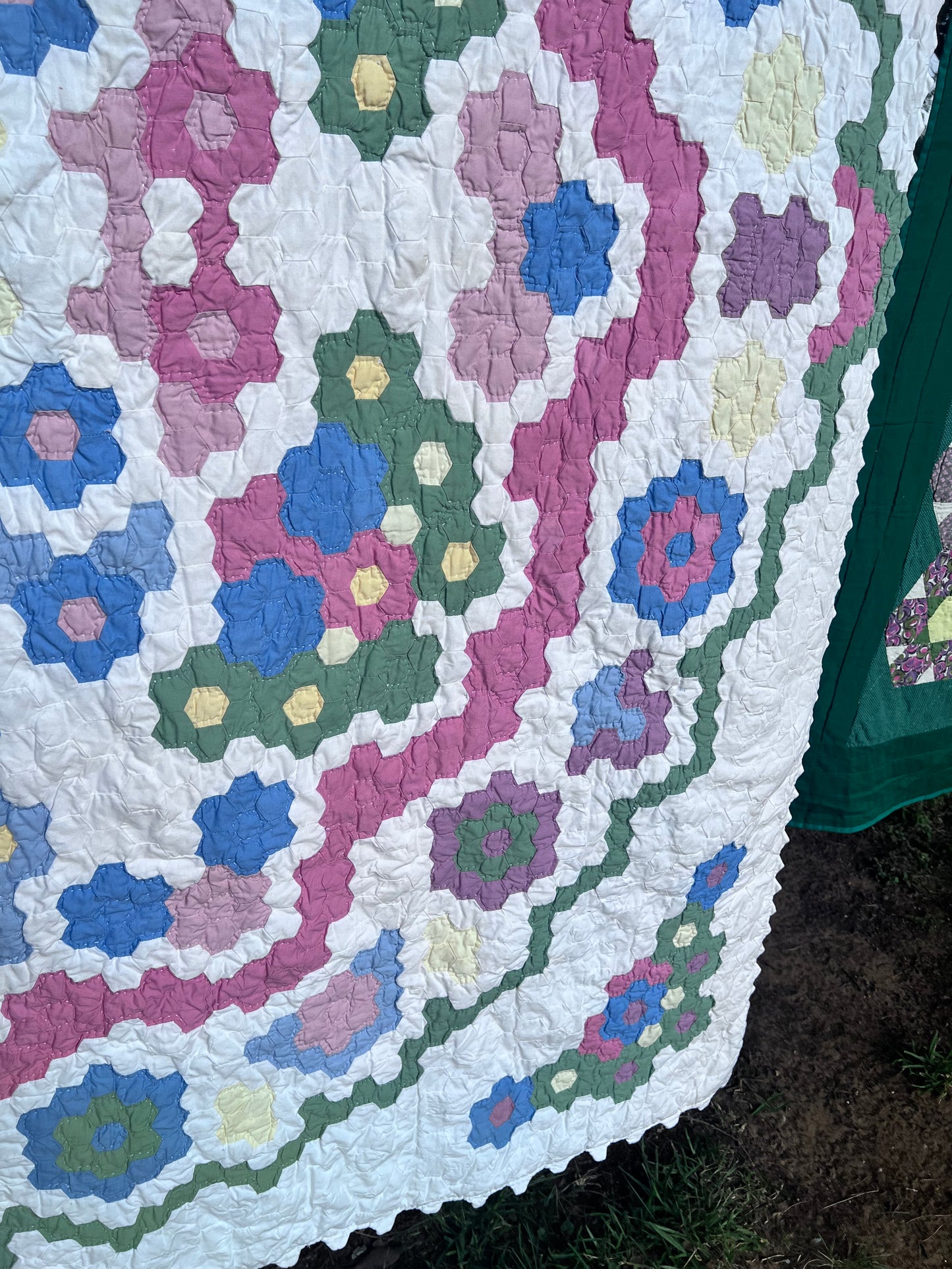 Tiny Hexi blocks creating a Grandmother's Flower Garden Style Vintage Quilt