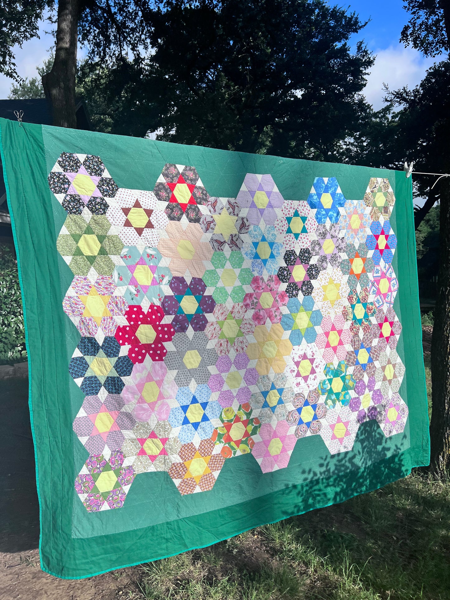 Gorgeous Vintage Quilt featuring Star of the West Block in a Floral Design