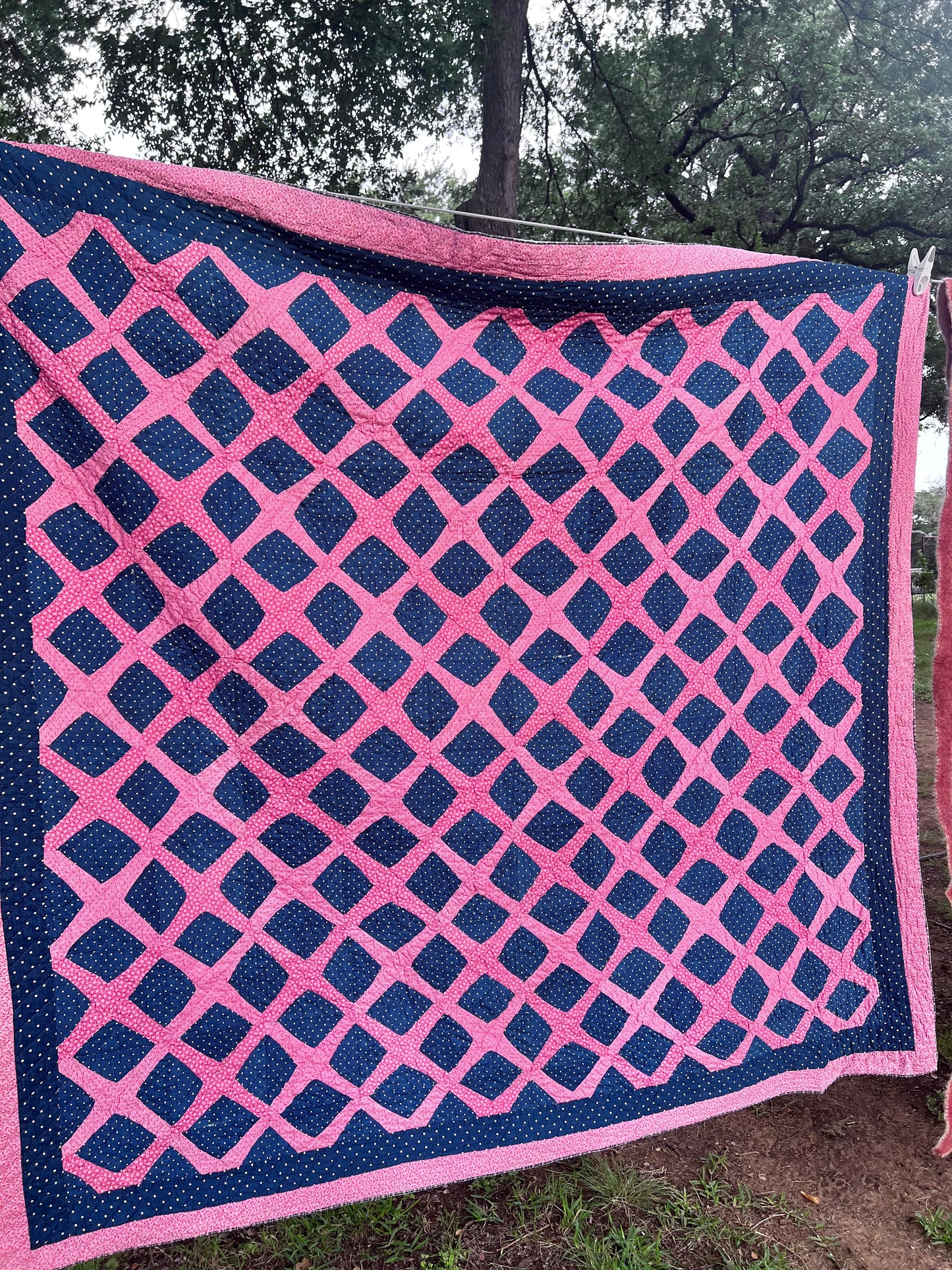 Graphic vintage quilt featuring a classic traditional pattern known as the Burgoyne Surrounded, Lattice, Trellis