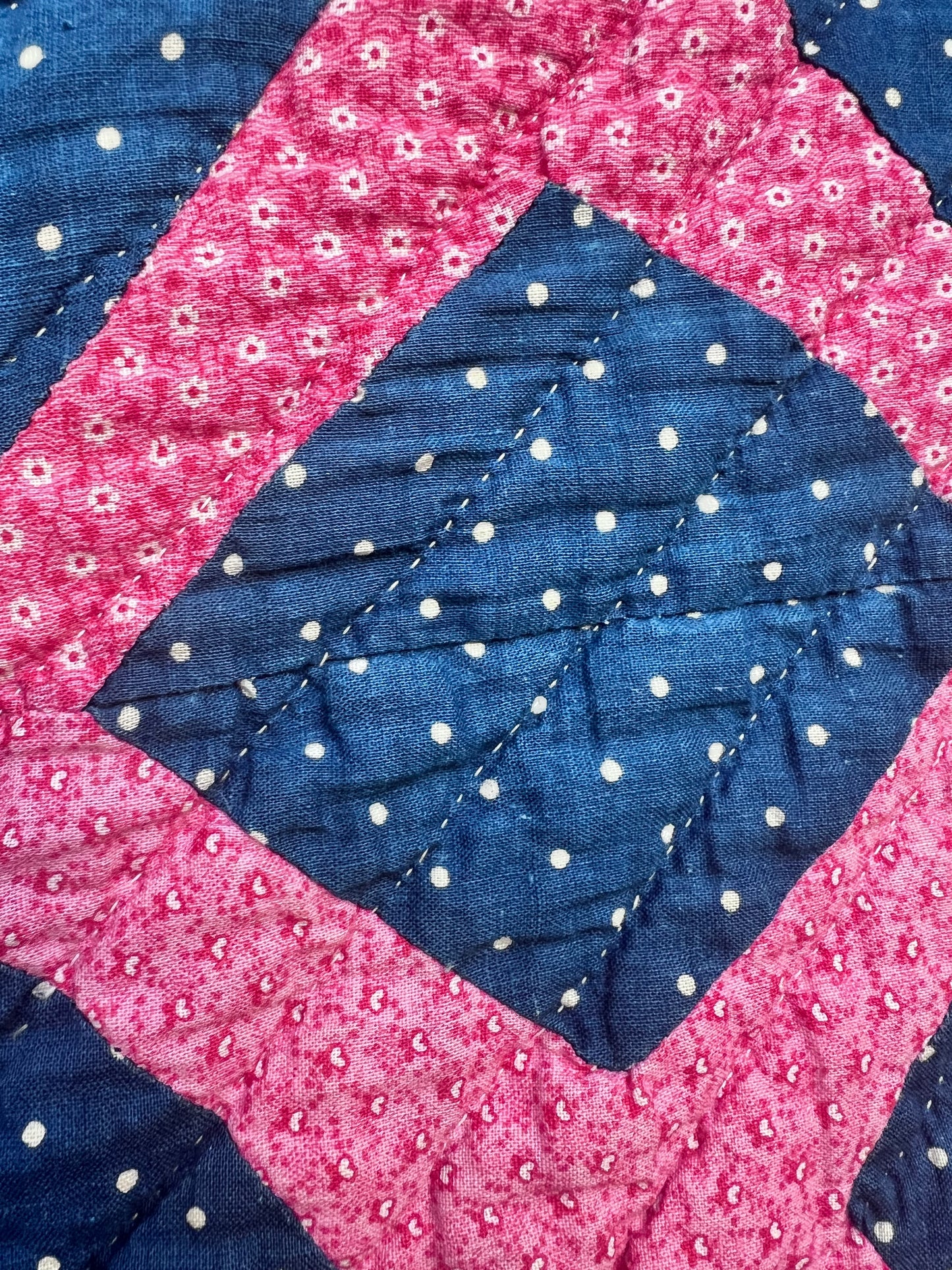 Graphic vintage quilt featuring a classic traditional pattern known as the Burgoyne Surrounded, Lattice, Trellis