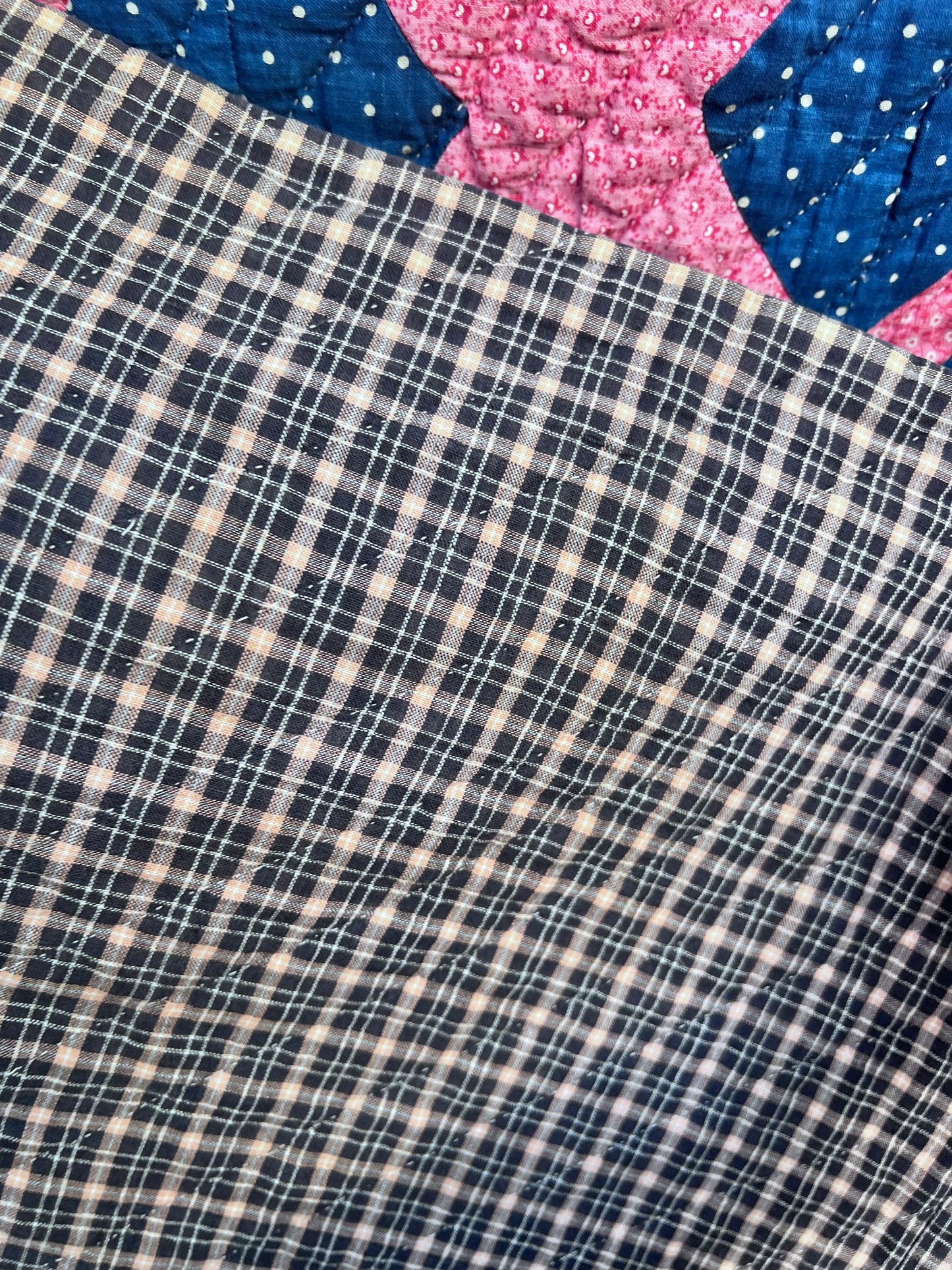 Graphic vintage quilt featuring a classic traditional pattern known as the Burgoyne Surrounded, Lattice, Trellis