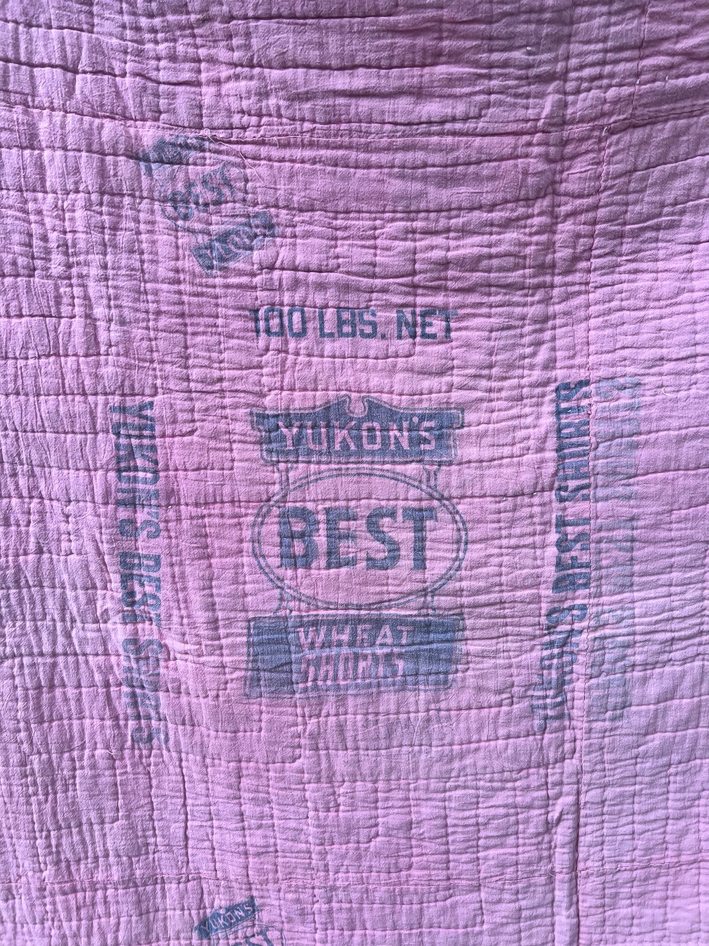 Iconic Vintage Bowtie Quilt in R,W & B while integrating a feedsack backing - Gorgeous!