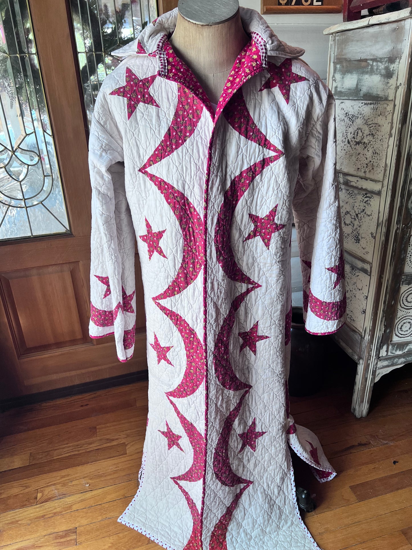Wrap yourself in American heritage with this stunning Duster, crafted from a cherished vintage eagle Americana quilt