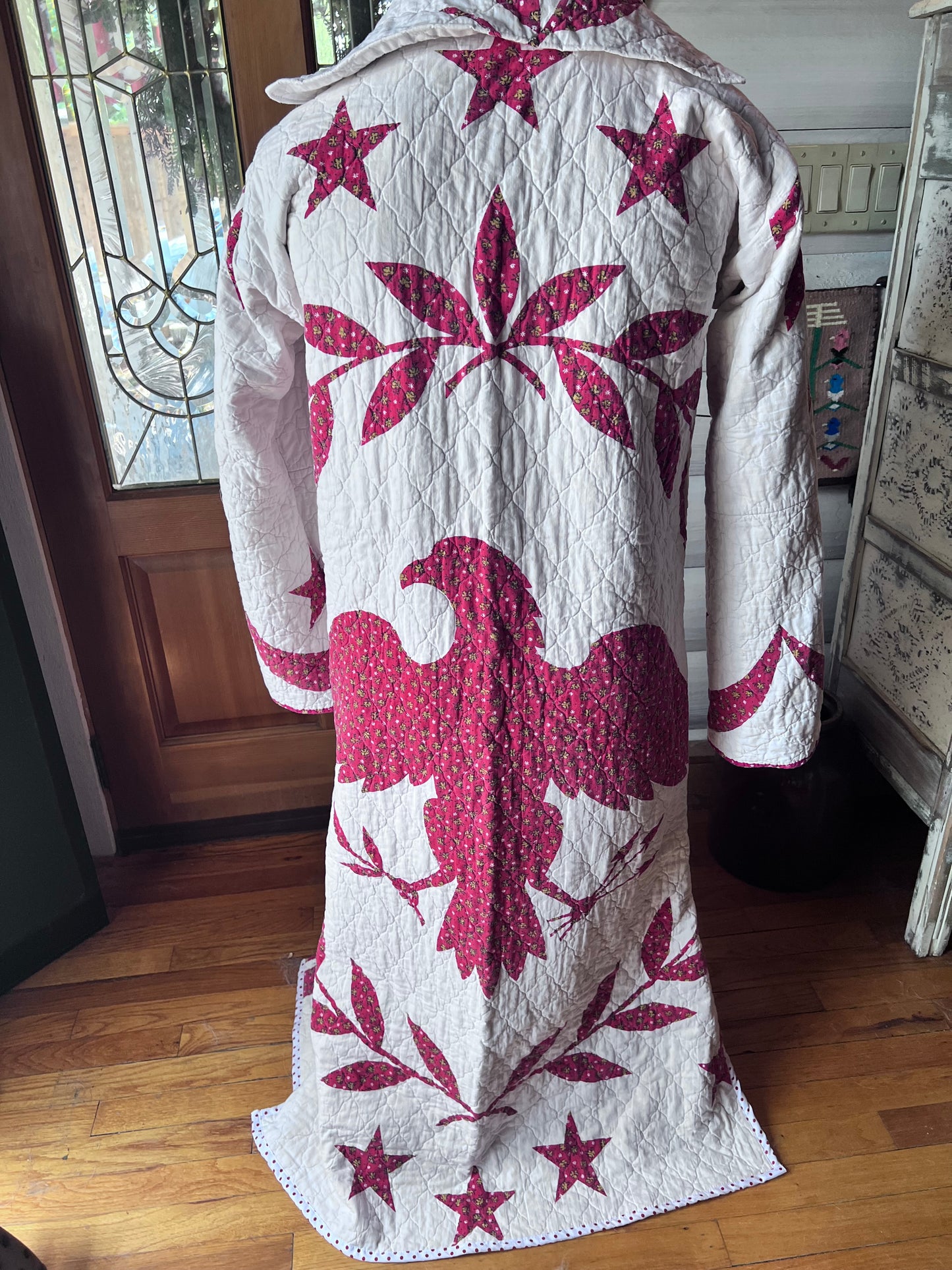 Wrap yourself in American heritage with this stunning Duster, crafted from a cherished vintage eagle Americana quilt