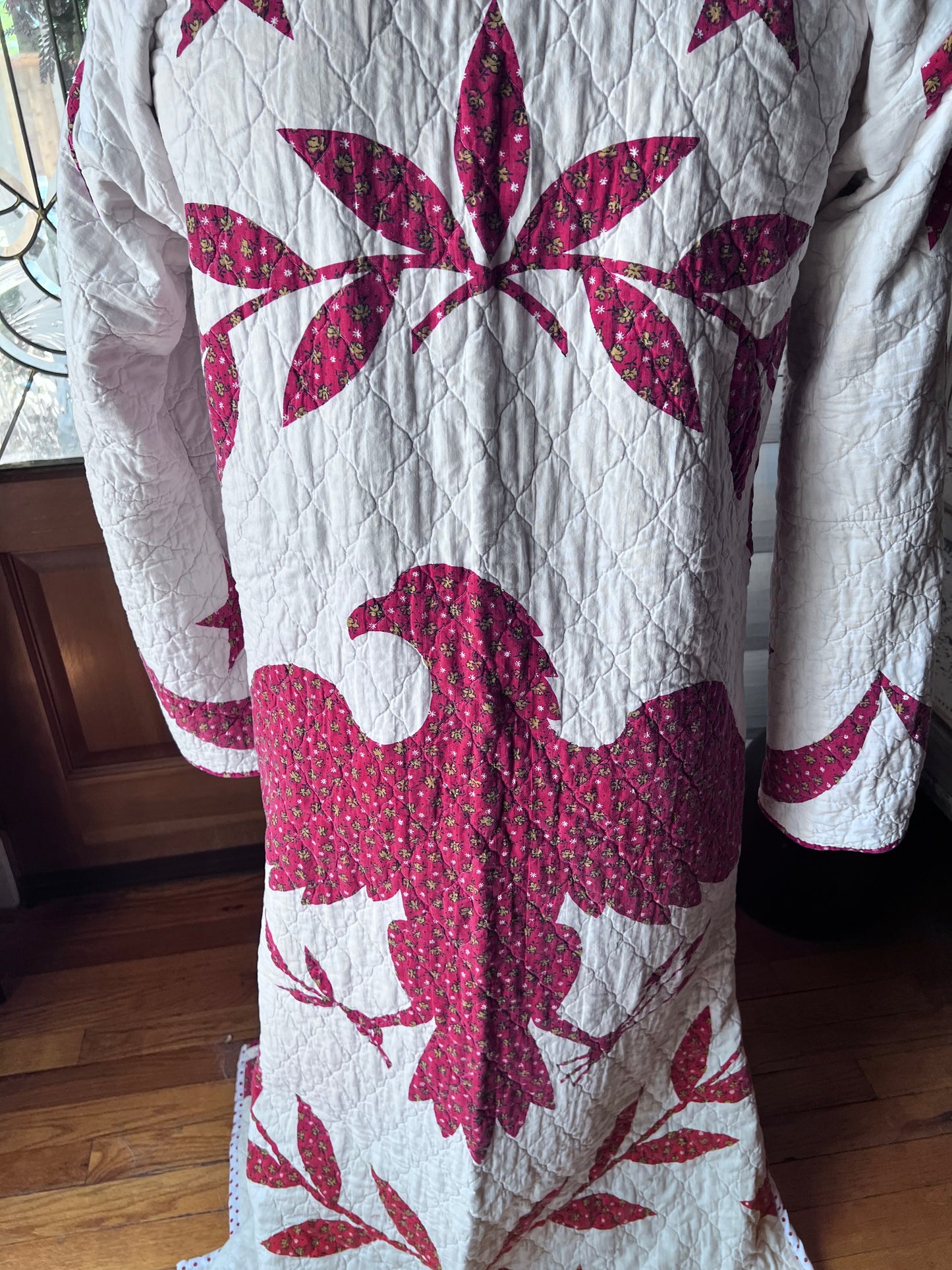 Wrap yourself in American heritage with this stunning Duster, crafted from a cherished vintage eagle Americana quilt