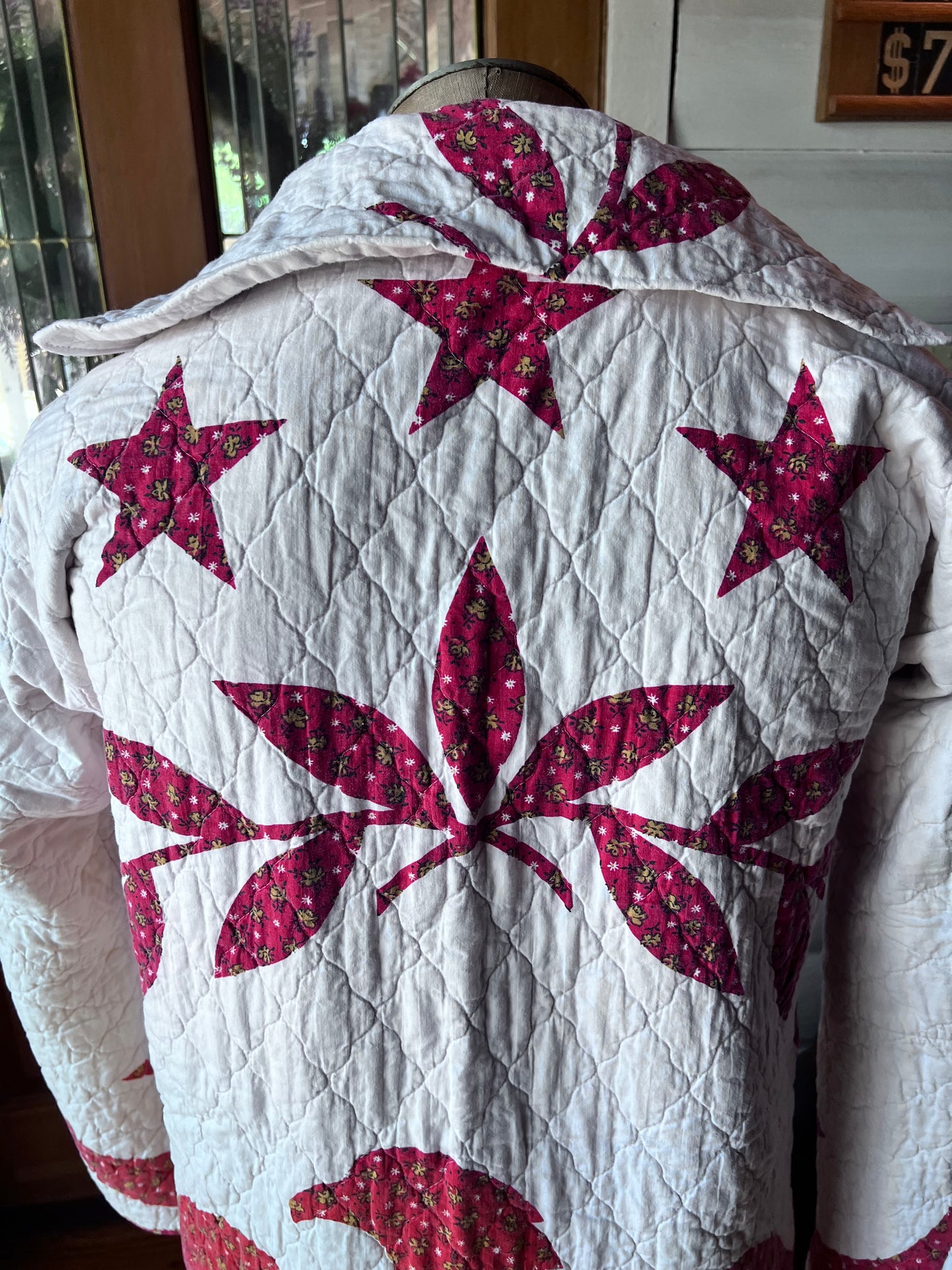 Wrap yourself in American heritage with this stunning Duster, crafted from a cherished vintage eagle Americana quilt