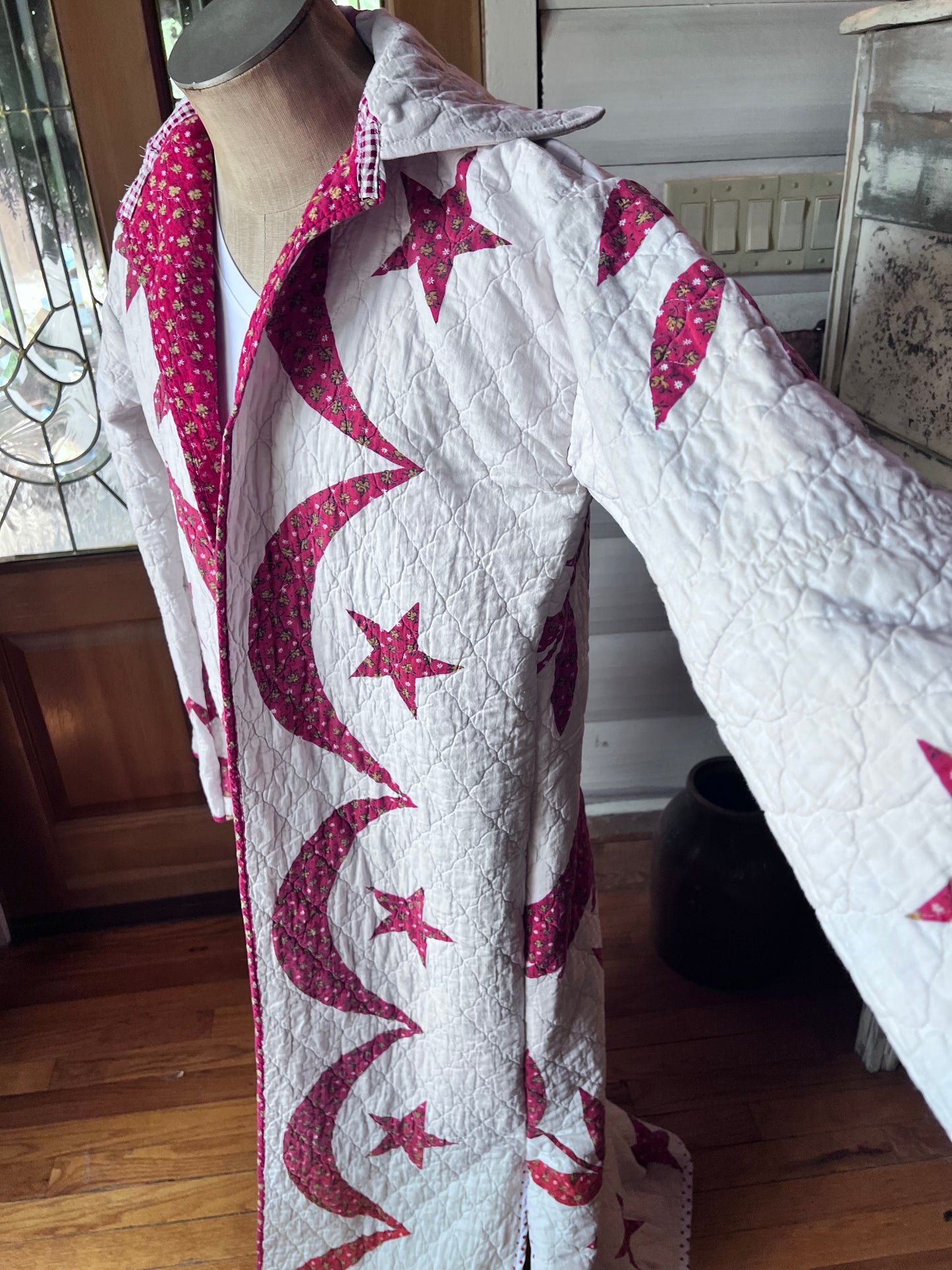 Wrap yourself in American heritage with this stunning Duster, crafted from a cherished vintage eagle Americana quilt