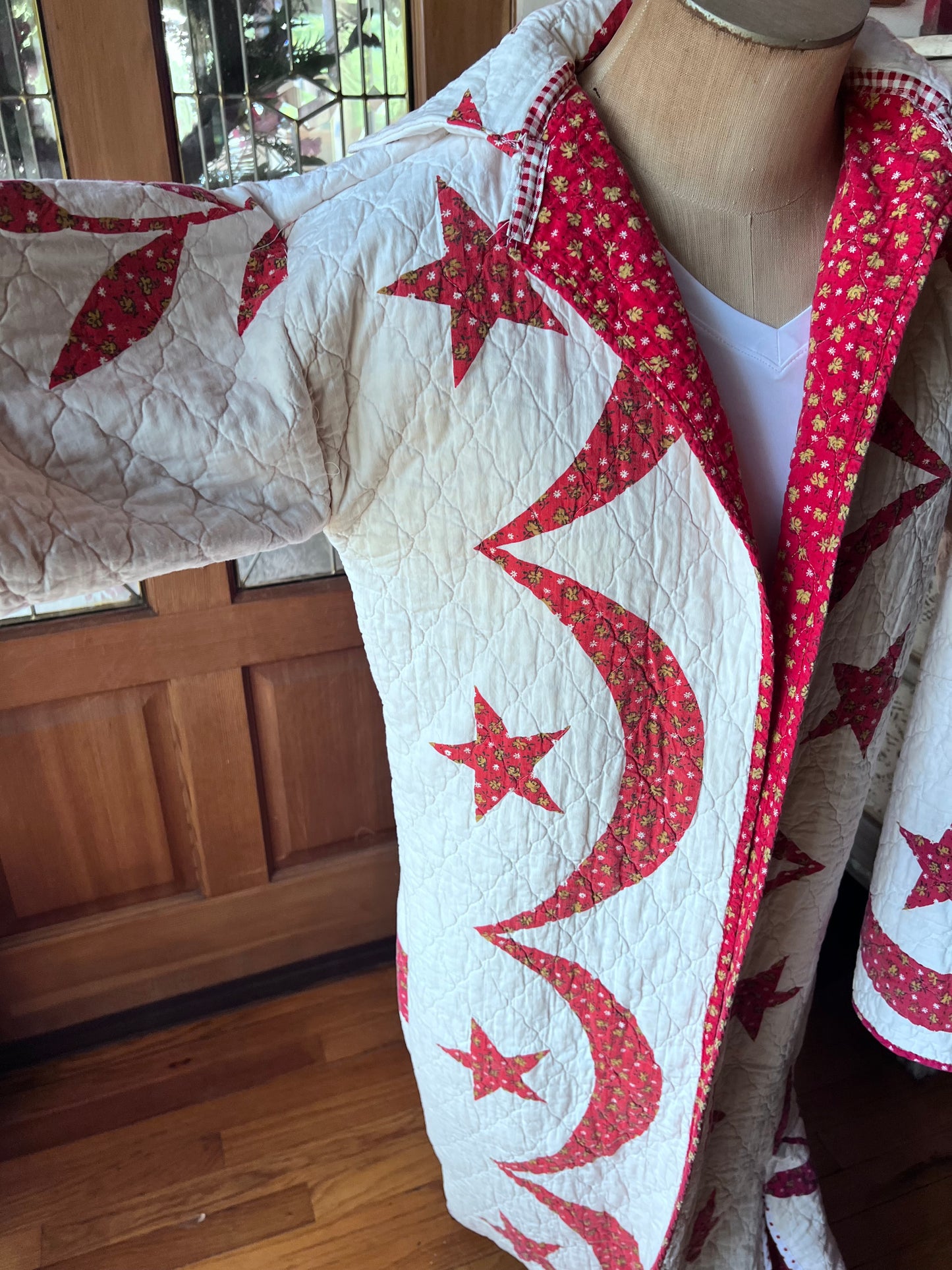 Wrap yourself in American heritage with this stunning Duster, crafted from a cherished vintage eagle Americana quilt