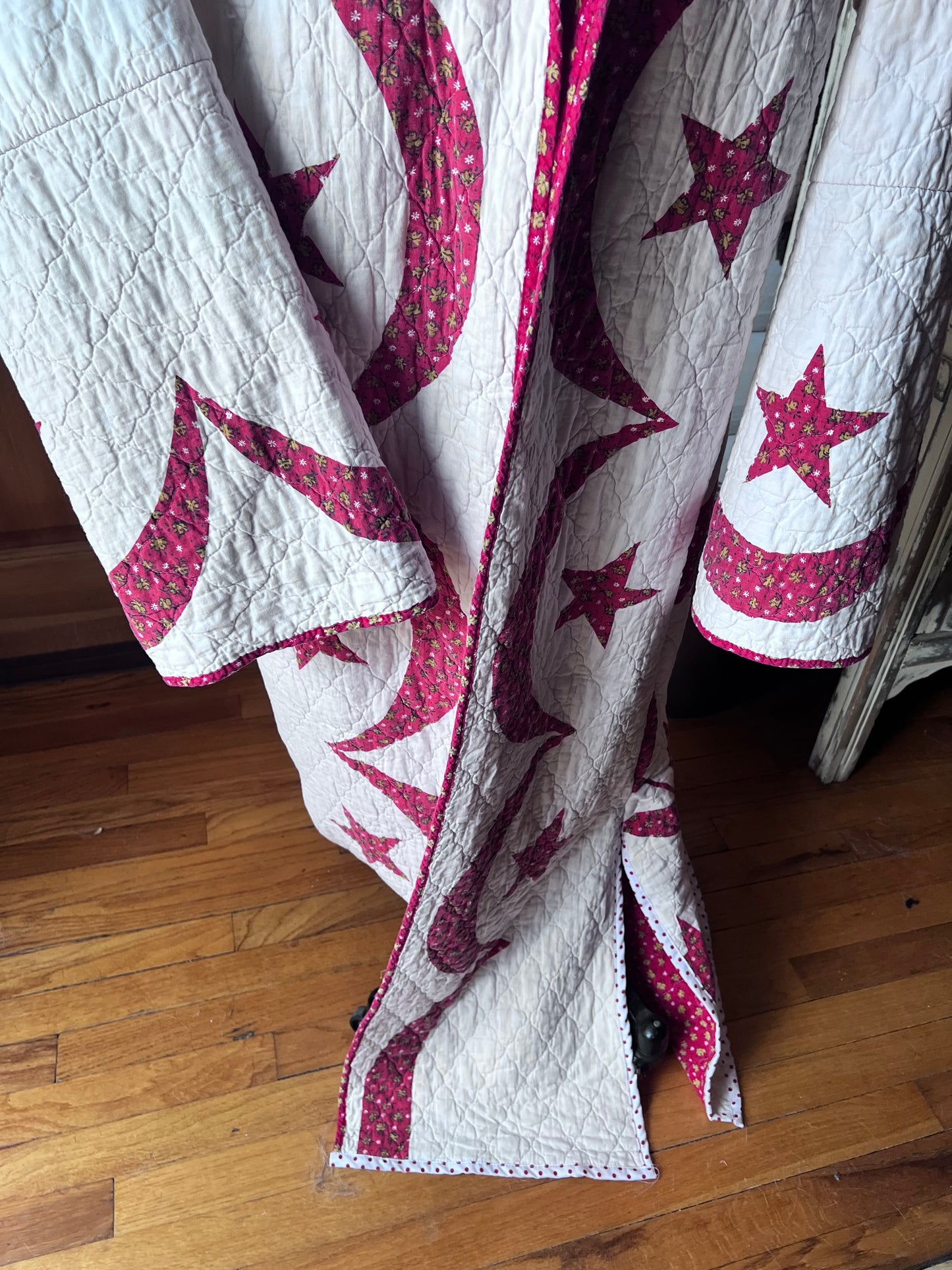 Wrap yourself in American heritage with this stunning Duster, crafted from a cherished vintage eagle Americana quilt