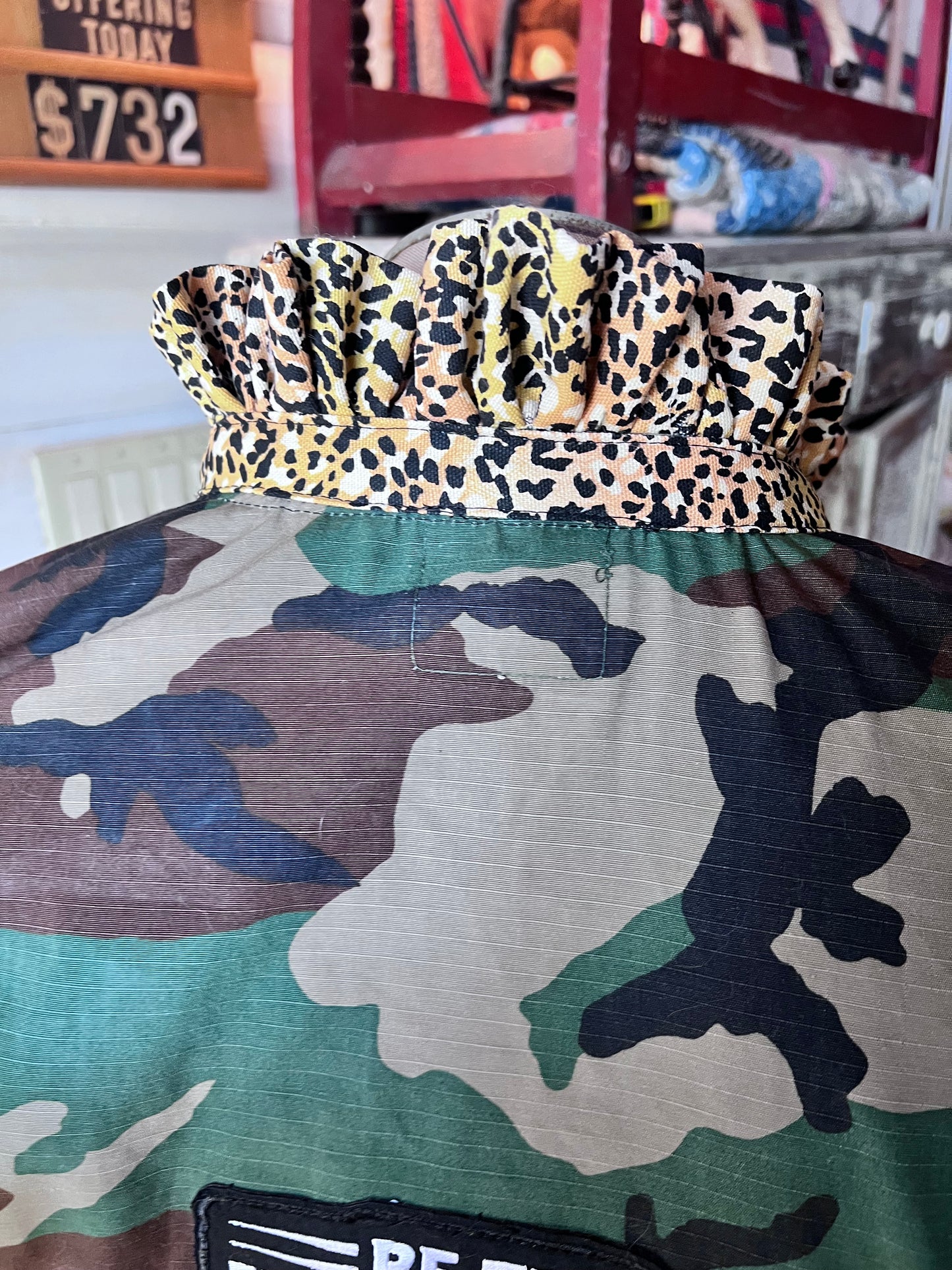 One of a kind Camo Jacket with a Leopard Ruffled Collar and Patches displaying your Faith