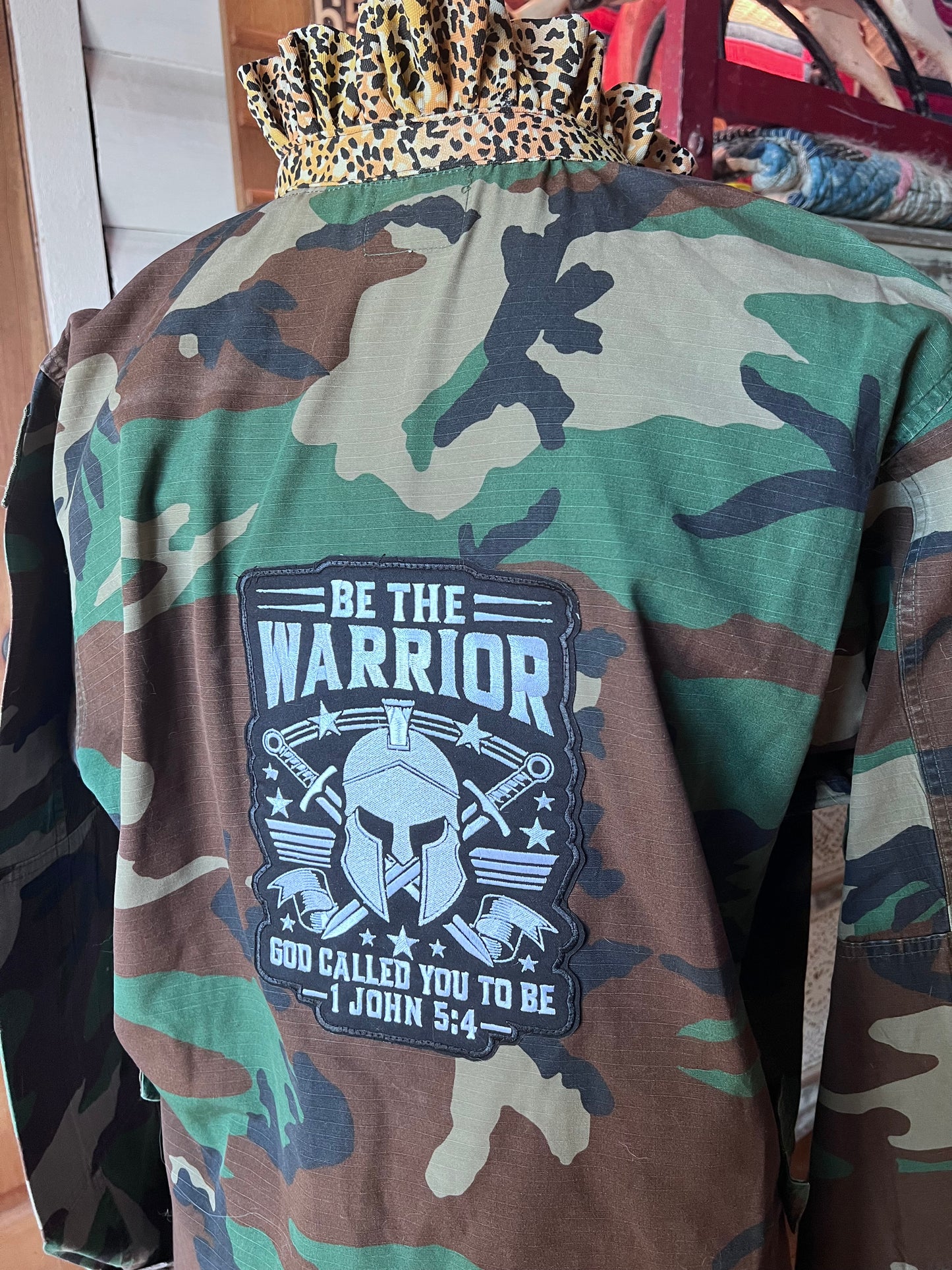 One of a kind Camo Jacket with a Leopard Ruffled Collar and Patches displaying your Faith